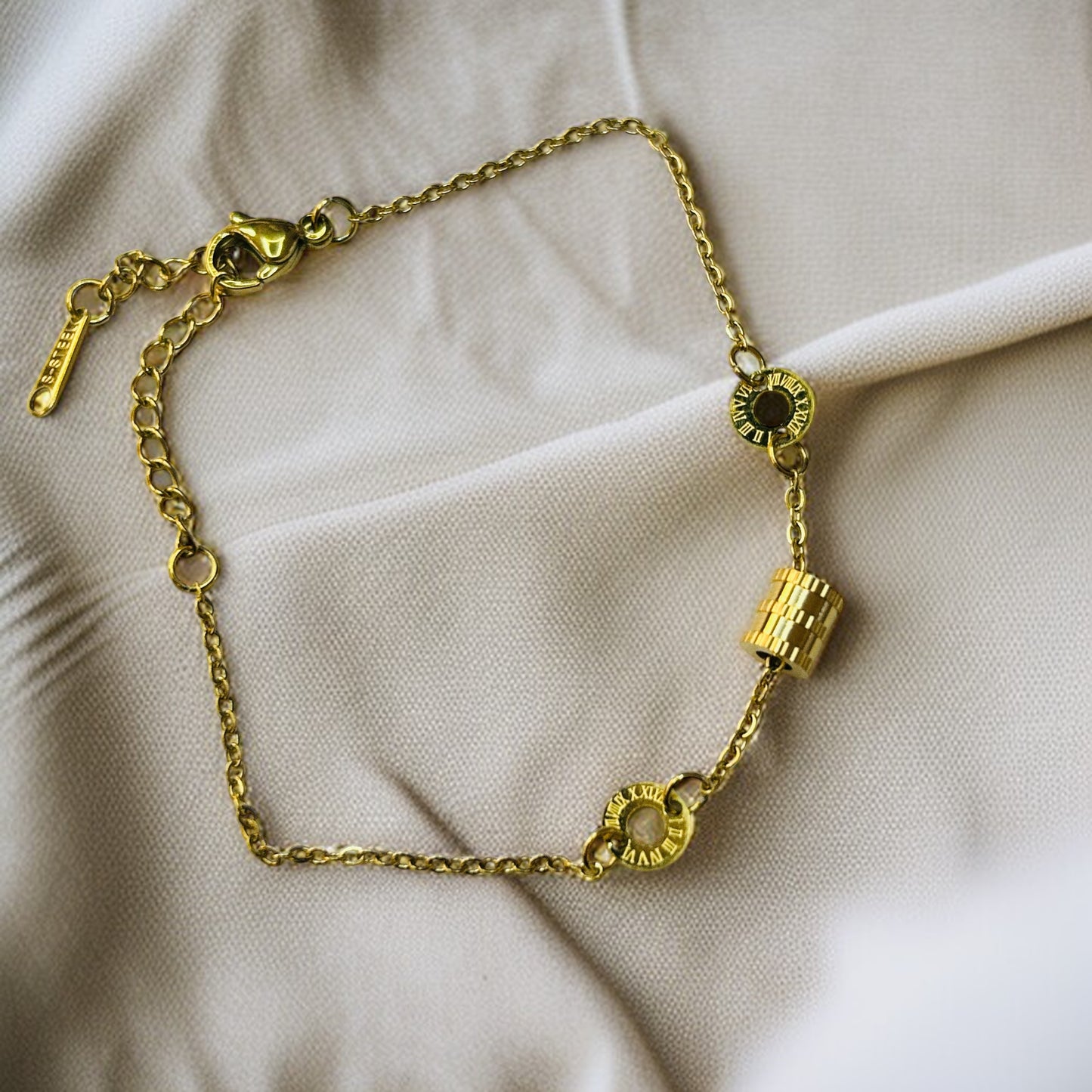 Timeless Glow – Roman Numeral Charm Bracelet